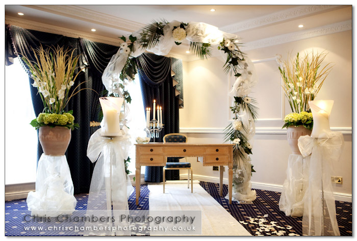 The ceremony room at Walton hall Wakefield. Floral arrangement from West End Florists in Wakefield