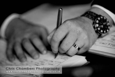 Signing the register wedding photography